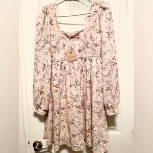 Brand new with tags boutique dress. Size medium. Retails for $48.